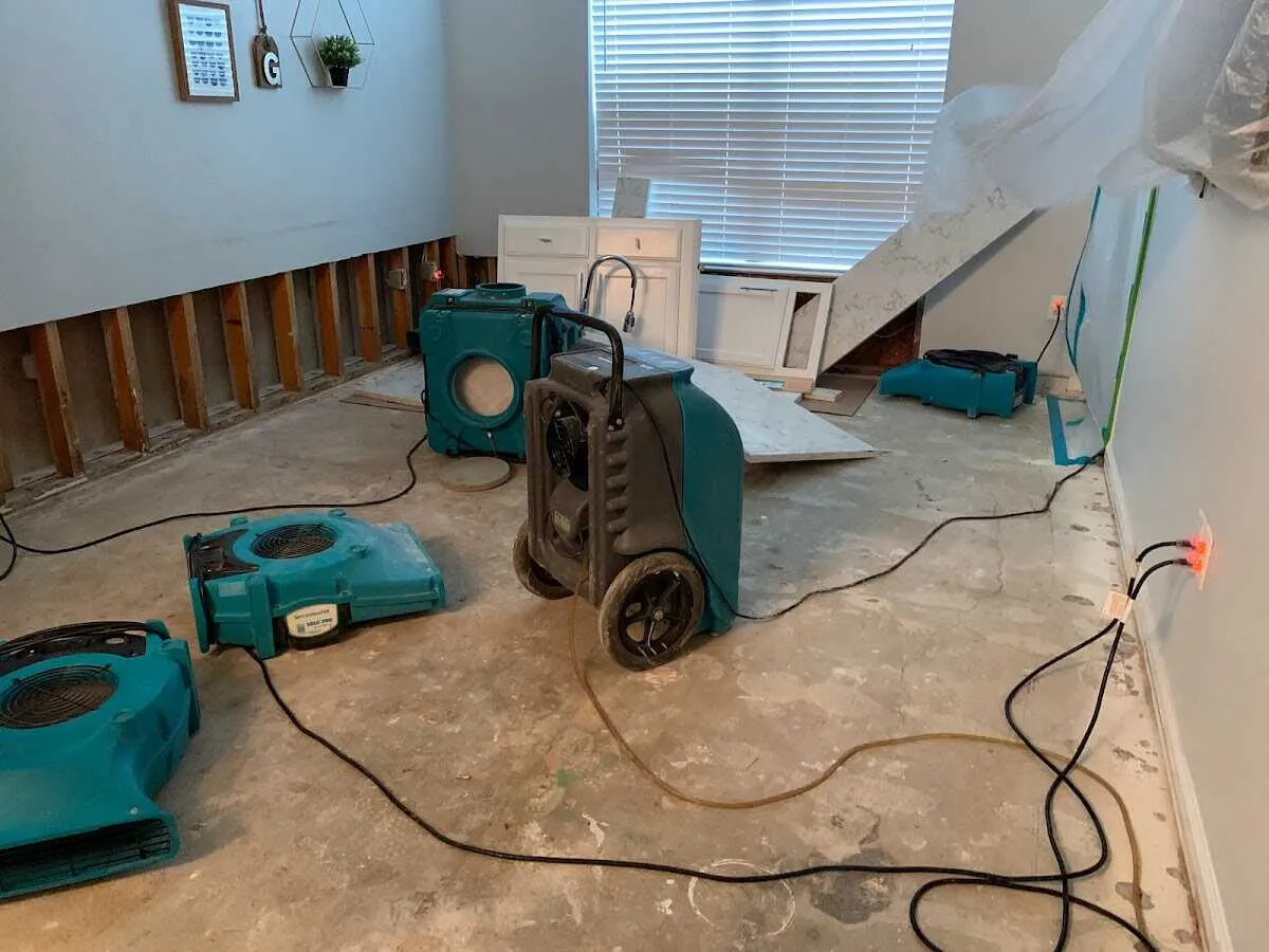 Dehumidifier in flood-cut room for Water Damage Restoration in Bensley